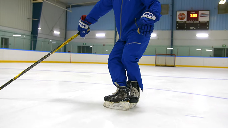 ice hockey skates stopping